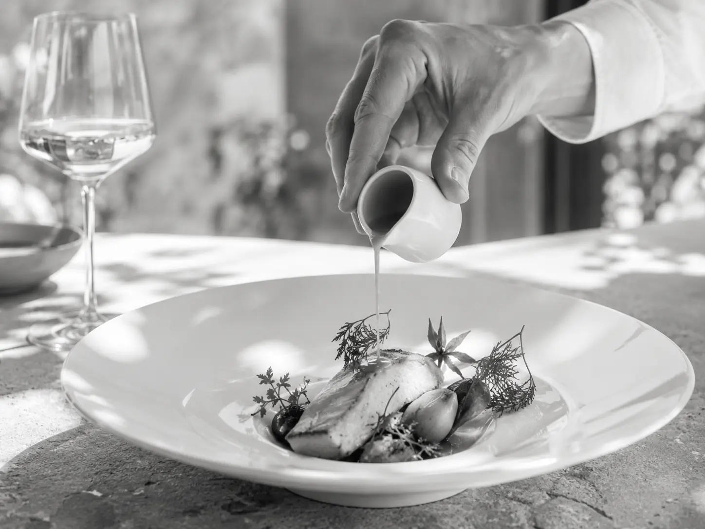 Gastronomy and art de vivre immersion in Provence with a chef preparing a refined Mediterranean dish